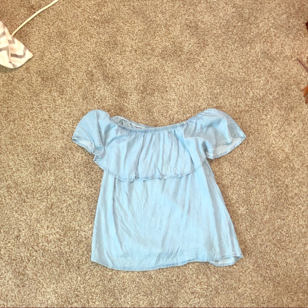 Off the should blue top